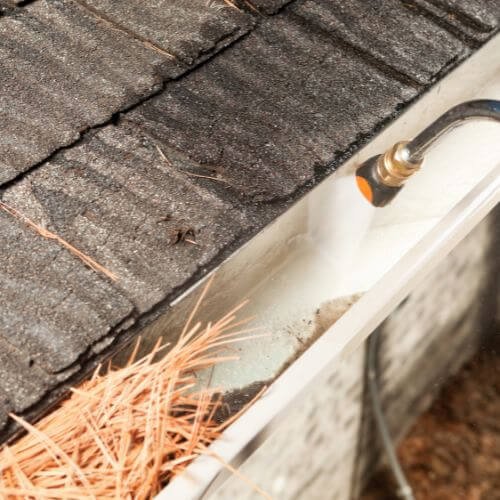 Rain Gutter Cleaning with Pressure Washer