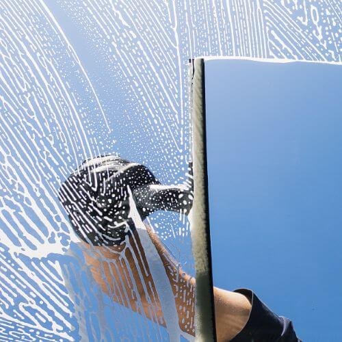 Professional Cleaning Window with Squeegee - Window Cleaning Service Bluffton, SC